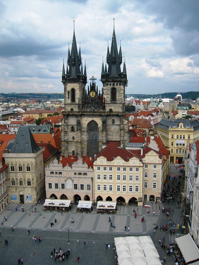 View of Old Town Square with its dominant Church of Our Lady before Tyn. It is the most remarkable Gothic church with a Baroque interior in Prague. View of Old Town Square with its dominant Church of Our Lady before Tyn. It is the most remarkable Gothic church with a Baroque interior in Prague.