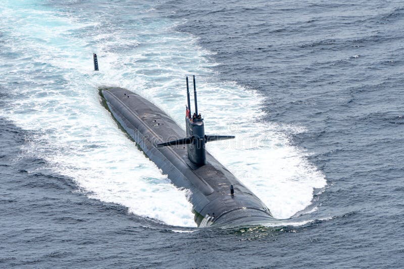 PHUKET, THAILAND - APRIL 9, 2018 : USS Louisville SSN-724 fast attack submarine of U.S.Navy sails on the surface of the sea during Guardian Sea 2019 Exercise hold in Thailand. PHUKET, THAILAND - APRIL 9, 2018 : USS Louisville SSN-724 fast attack submarine of U.S.Navy sails on the surface of the sea during Guardian Sea 2019 Exercise hold in Thailand