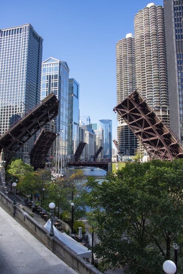 October 16, 2022 - Chicago, IL, USA: Bridges in a raised position over the Chicago River in downtown Chicago. October 16, 2022 - Chicago, IL, USA: Bridges in a raised position over the Chicago River in downtown Chicago.