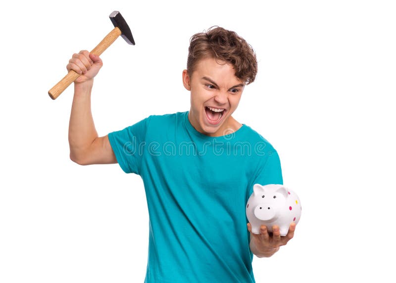 Portrait of teen boy holding Piggy Bank and Hammer. Cute caucasian young teenager isolated on white background. Saving Money concept. Crazy funny child about to break his piggybank. Portrait of teen boy holding Piggy Bank and Hammer. Cute caucasian young teenager isolated on white background. Saving Money concept. Crazy funny child about to break his piggybank