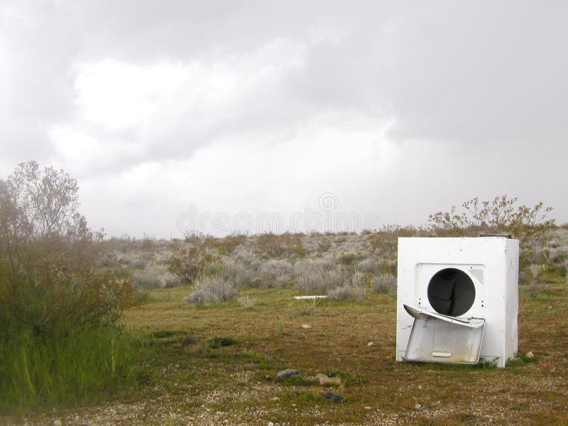 An old washing machine is one of the few remains of Llano del Rio, once a small community in rural California. Taken on a rainy day. An old washing machine is one of the few remains of Llano del Rio, once a small community in rural California. Taken on a rainy day.