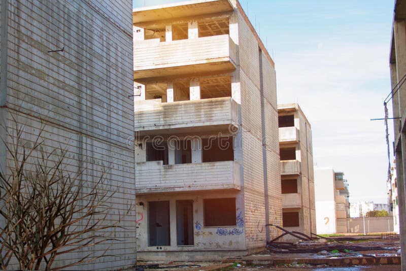 Abandoned unfinished house on a construction site because of the crisis. Abandoned unfinished house on a construction site because of the crisis