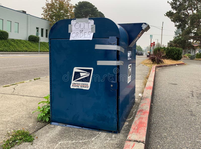 Everett WA. USA - 09/14/2020: USPS postal drop box with hand written out of order sign on it in front of local Post Office. Everett WA. USA - 09/14/2020: USPS postal drop box with hand written out of order sign on it in front of local Post Office