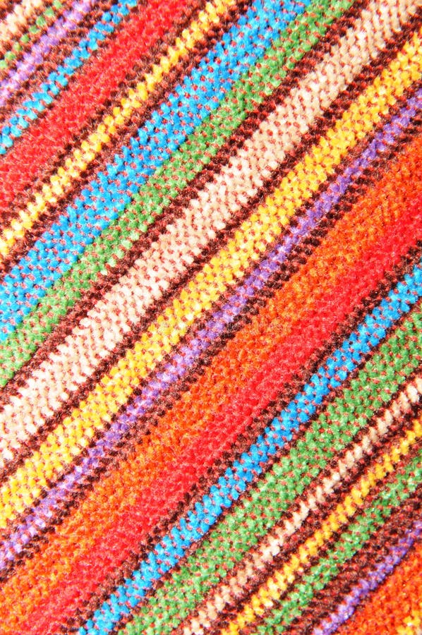 Detail of colorful beach towel texture suitable as background. Detail of colorful beach towel texture suitable as background