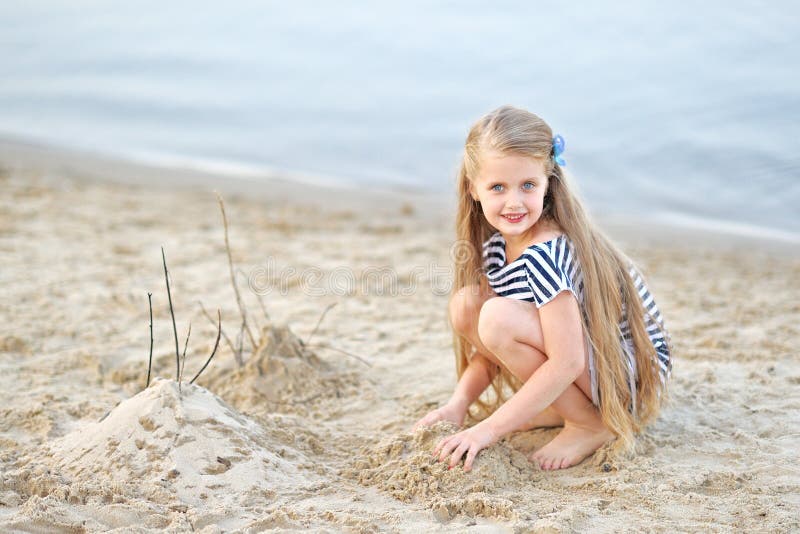 Portrait of little girl on a summer beach. Portrait of little girl on a summer beach