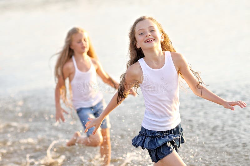 Portrait of children on the beach in summer. Portrait of children on the beach in summer