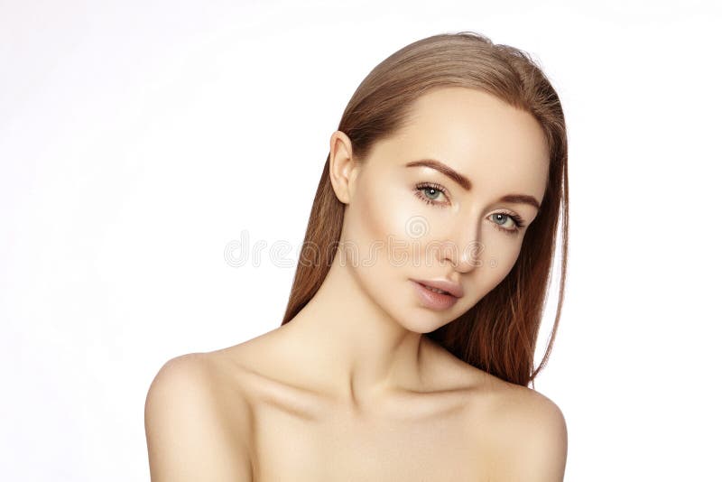 Portrait of beautiful woman with perfect clean skin. Spa look, Wellness and health Face. Daily Make-up. Skincare routine on white background. Portrait of beautiful woman with perfect clean skin. Spa look, Wellness and health Face. Daily Make-up. Skincare routine on white background
