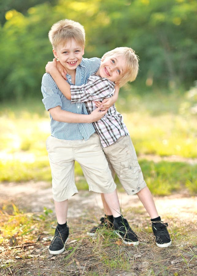 Portrait of young children on a camping holiday. Portrait of young children on a camping holiday