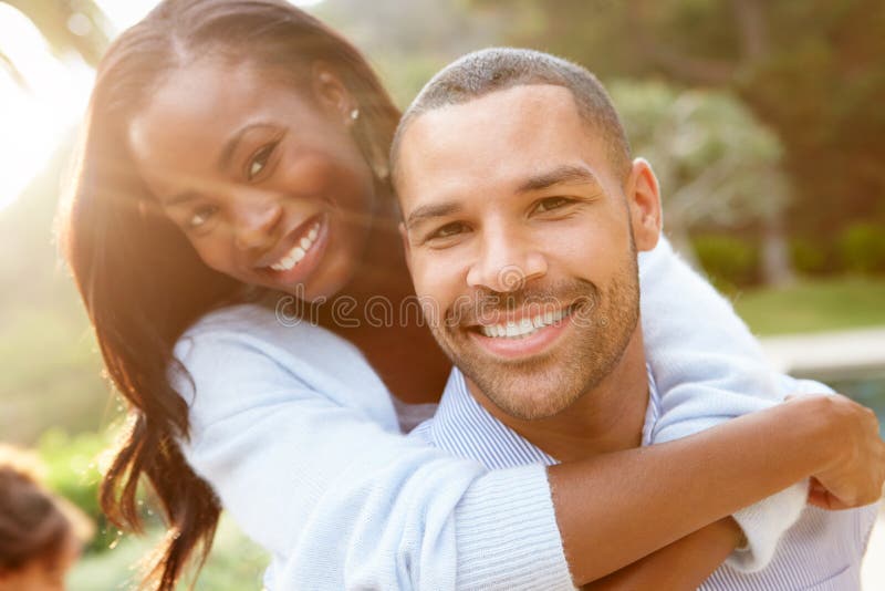 Portrait Of Loving African American Couple In Countryside Smiling At Camera. Portrait Of Loving African American Couple In Countryside Smiling At Camera