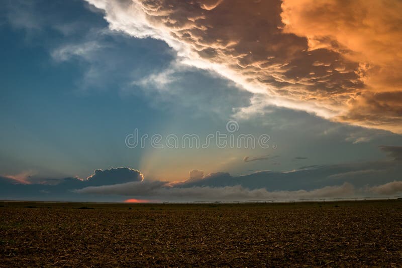 After chasing supercell thunderstorms in the northern Texas panhandle we witnessed some amazing sunset colors at the back of this severe thunderstorm. After chasing supercell thunderstorms in the northern Texas panhandle we witnessed some amazing sunset colors at the back of this severe thunderstorm.
