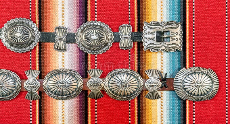 Sterling Silver Native American Concho Belt on Brightly Colored Southwestern Pattern Fabric. Sterling Silver Native American Concho Belt on Brightly Colored Southwestern Pattern Fabric.