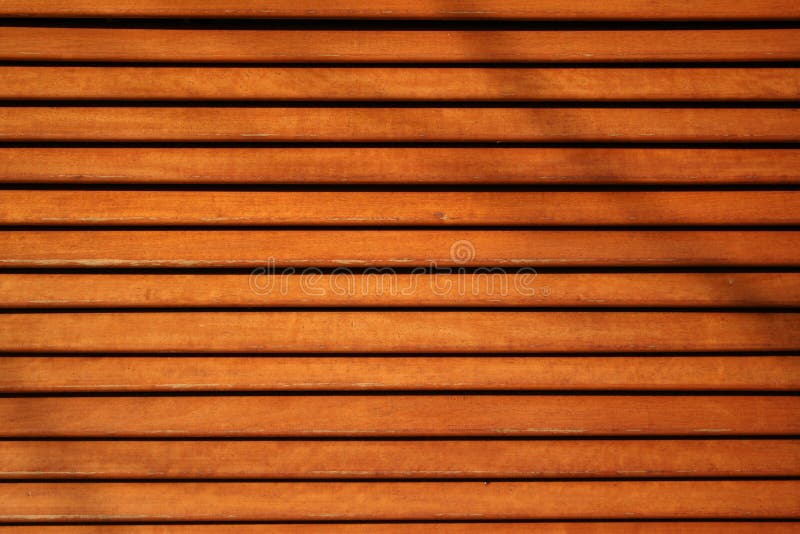 Wooden slats background with horizontal overlapping boards. Wooden slats background with horizontal overlapping boards