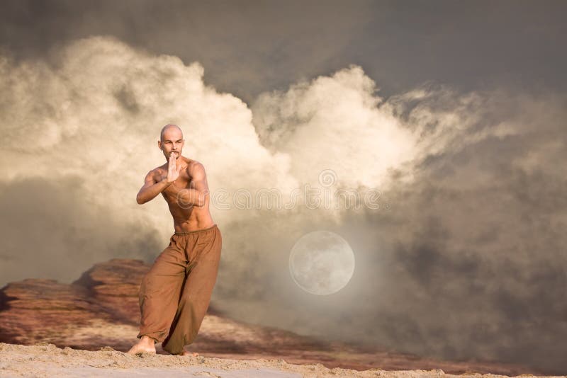 Martial Arts in Front of Rocks and Clouds Background. Martial Arts in Front of Rocks and Clouds Background