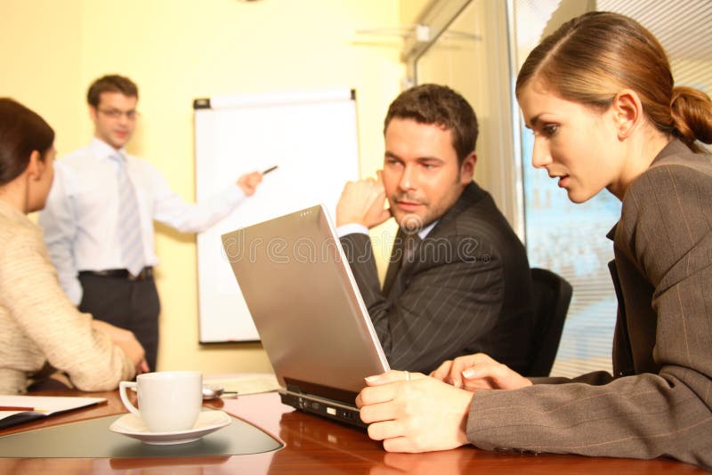 Presentation. Business people working in the office - 2 man, 2 woman. Presentation. Business people working in the office - 2 man, 2 woman