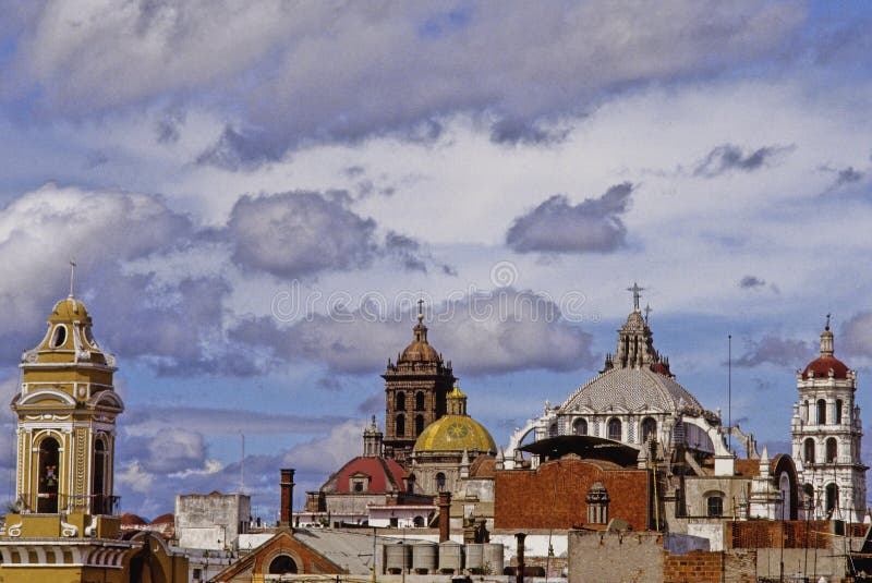 Beauty sky with towers and domes downtown in the city of puebla. In 1987, the historic center of Puebla is declared a World Heritage Site by UNESCO. Beauty sky with towers and domes downtown in the city of puebla. In 1987, the historic center of Puebla is declared a World Heritage Site by UNESCO