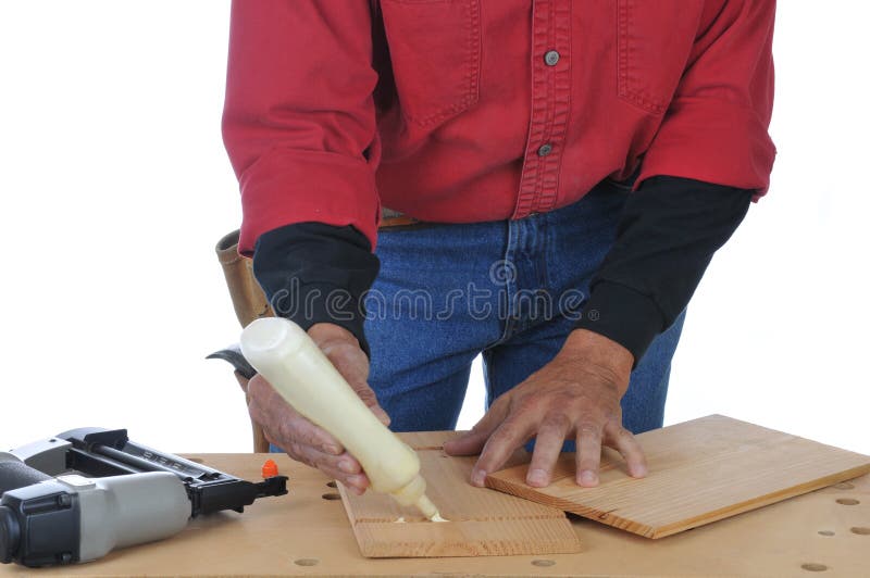 прикладывать woodworker клея стоковые изображения прикладывать woodworker клея стоковые изображения