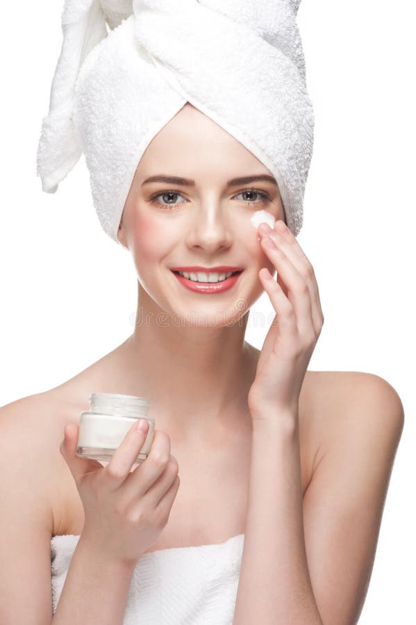 прикладывать женщину сливк moisturizing стоковые изображения