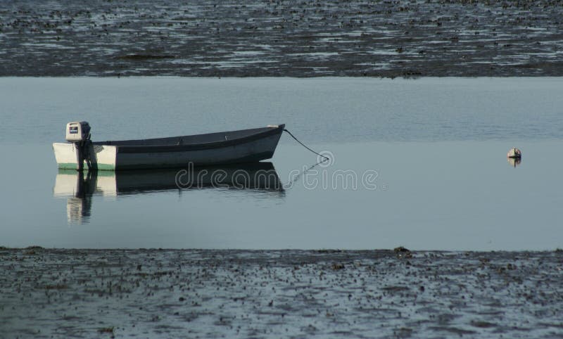 Maine scenic with small boat anchored at low tide. Maine scenic with small boat anchored at low tide