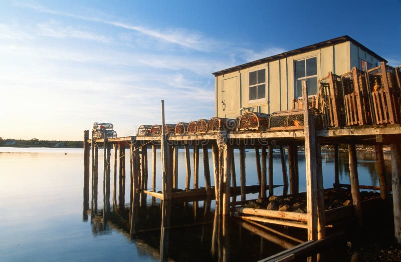 Wooden fishing pier with lobster traps, Lobster Village, Mount Desert Island, Maine. Wooden fishing pier with lobster traps, Lobster Village, Mount Desert Island, Maine