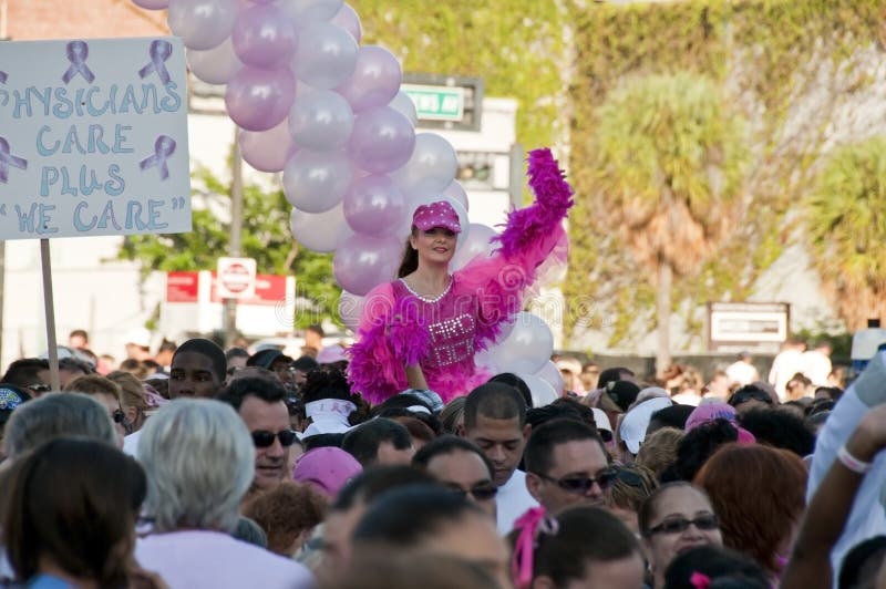 Thousands of people gather all over the country every year to support research for a cure for breast cancer. Thousands of people gather all over the country every year to support research for a cure for breast cancer.