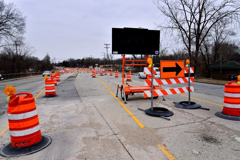 Racine, Wisconsin / USA - January 18, 2019: Road construction continues on Highway 38 and County MM through winter. Racine, Wisconsin / USA - January 18, 2019: Road construction continues on Highway 38 and County MM through winter.