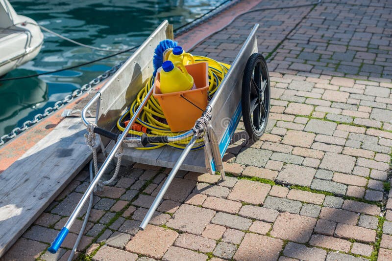 Professional cleaning cart with equipment for washing the yacht. Professional cleaning cart with equipment for washing the yacht.