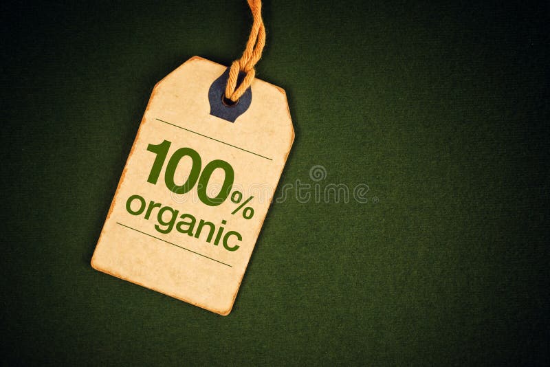 100 Percent Organic Food on Vintage Price Label Tag Label on Green Grunge Textured Backgroundas, Top View. 100 Percent Organic Food on Vintage Price Label Tag Label on Green Grunge Textured Backgroundas, Top View.