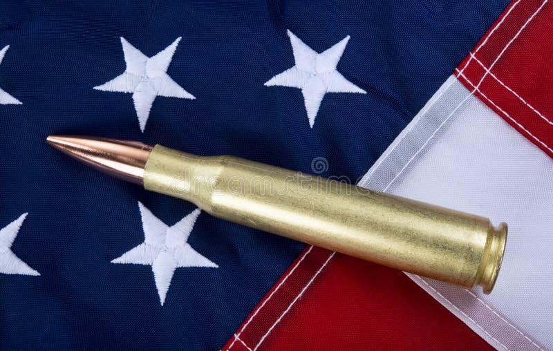 50 caliber brass bullet on American flag with room for your type. 50 caliber brass bullet on American flag with room for your type..