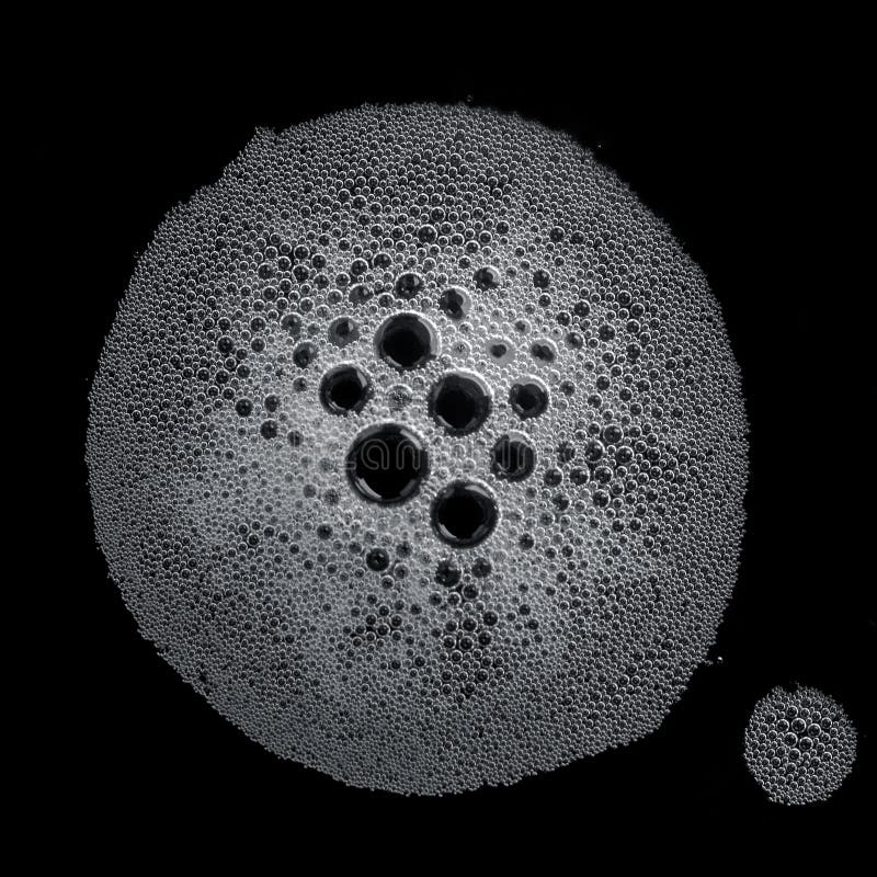 Large and a small bubble - detergent foam. Large and a small bubble - detergent foam