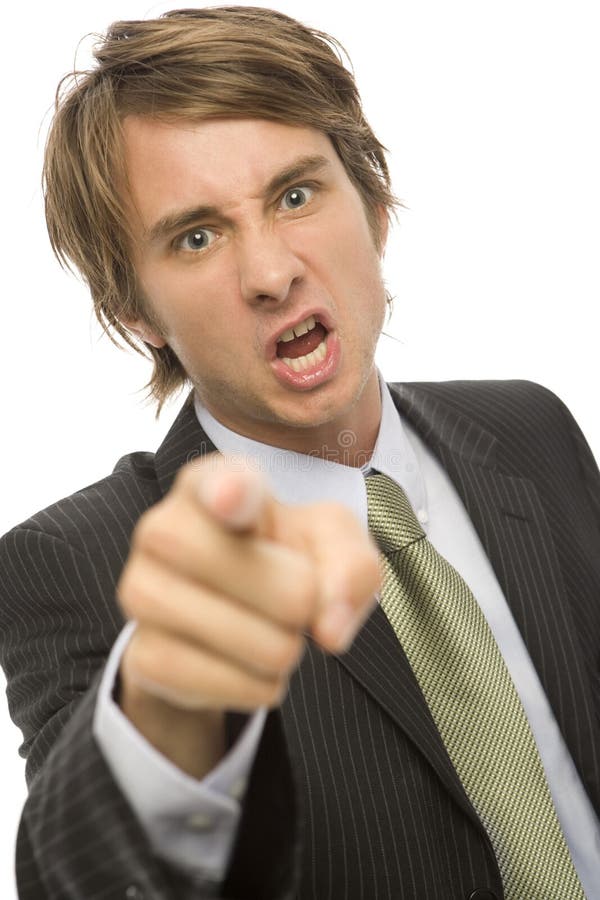 Businessman in a suit points with his finger in anger. Businessman in a suit points with his finger in anger