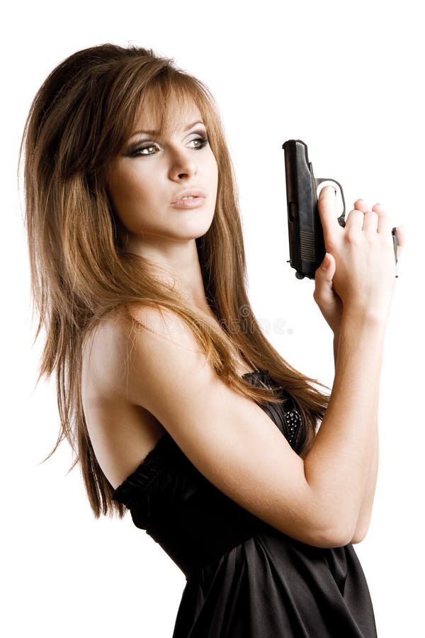 girl in black dress holding a gun on white background. girl in black dress holding a gun on white background