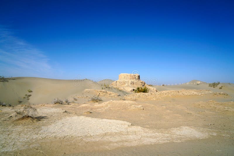 Rawak is a Buddhist stupa located on the southern rim of the Taklamakan Desert in China, along the famous trade route known as the Silk Road in the first millennium Kingdom of Khotan. Around the stupa there are other smaller structures which were originally decorated with a large number of colossal statues. The courtyard of the temple was surrounded by a wall, which contained terracotta relieves and some wall-paintings. The stupa and other structures form a three-dimensional mandala. The site is now about 40 km north of the modern city of Hotan in Xinjiang Autonomous Region of the People`s Republic of China.

The archaeologist Aurel Stein first visited Rawak during his First Central Asian expedition in April 1901. Rawak is a Buddhist stupa located on the southern rim of the Taklamakan Desert in China, along the famous trade route known as the Silk Road in the first millennium Kingdom of Khotan. Around the stupa there are other smaller structures which were originally decorated with a large number of colossal statues. The courtyard of the temple was surrounded by a wall, which contained terracotta relieves and some wall-paintings. The stupa and other structures form a three-dimensional mandala. The site is now about 40 km north of the modern city of Hotan in Xinjiang Autonomous Region of the People`s Republic of China.

The archaeologist Aurel Stein first visited Rawak during his First Central Asian expedition in April 1901.