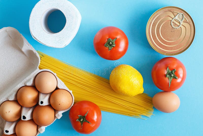 Различные продукты питания, содержащие полезные продукты, на синем фоне Верхнее представление фруктовый, овощной, яичный и продук стоковые фотографии rf Различные продукты питания, содержащие полезные продукты, на синем фоне Верхнее представление фруктовый, овощной, яичный и продук стоковые фотографии rf