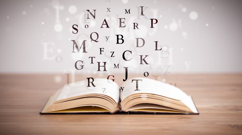 Раскрытая книга с письмами летания стоковое изображение rf