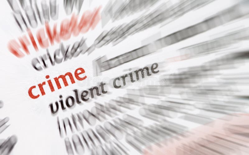 Close-up of the word crime with radial blurred applied. Crime can be violent and of many forms including political, electronic etc. Close-up of the word crime with radial blurred applied. Crime can be violent and of many forms including political, electronic etc