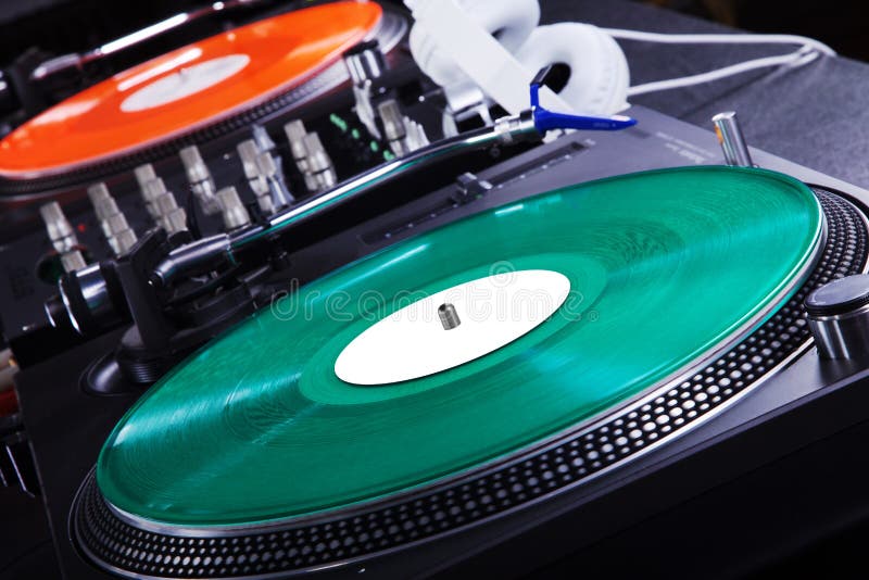 Record player with colored vinyl record and headphone. Record player with colored vinyl record and headphone