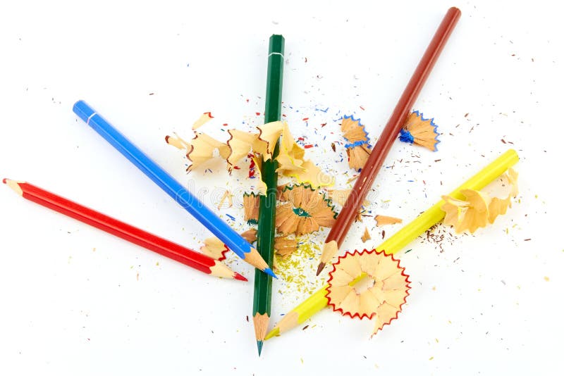 Five colored pencils and a bunch of shavings. Five colored pencils and a bunch of shavings