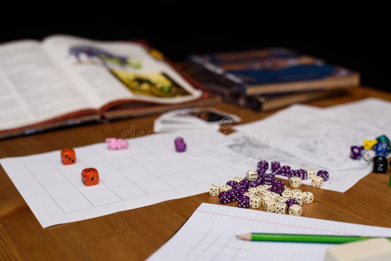 Роль играя установку игры на таблице изолированной на черной предпосылке стоковая фотография rf Роль играя установку игры на таблице изолированной на черной предпосылке стоковая фотография rf