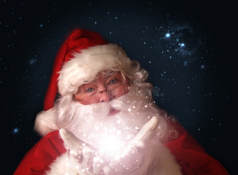 рождество вручает светам удерживания волшебный santa стоковая фотография rf рождество вручает светам удерживания волшебный santa стоковая фотография rf