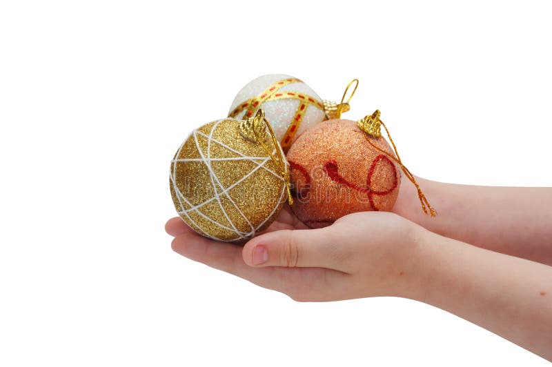 рождество ребенка шариков вручает удерживание 3 стоковые фото