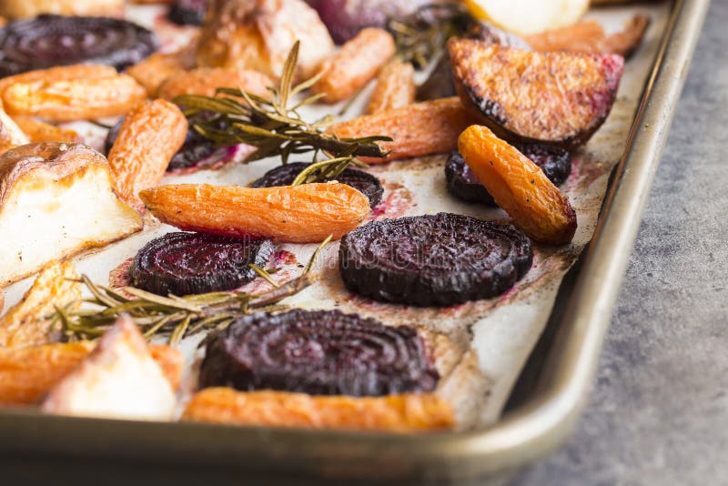 Beets, carrots, potatoes and purple onions roasted with rosemary. Beets, carrots, potatoes and purple onions roasted with rosemary