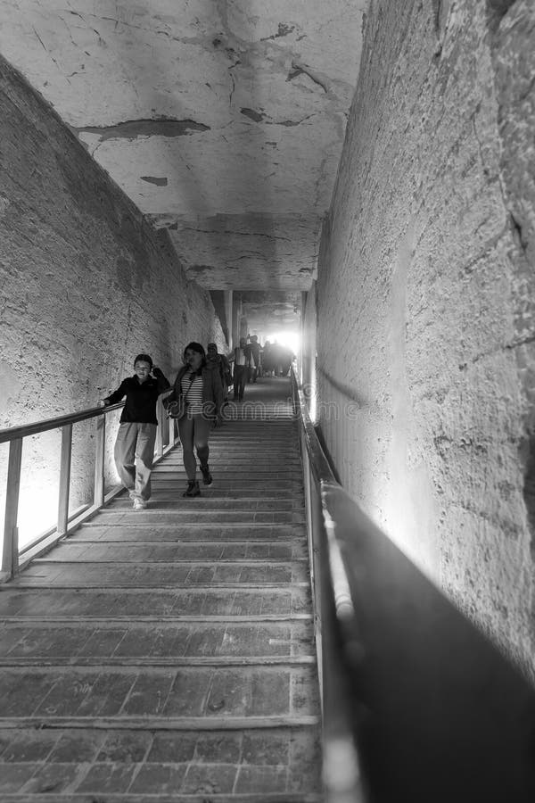 Luxor, Egypt Tourists at a tomb in Valley of the Kings. Luxor, Egypt Tourists at a tomb in Valley of the Kings