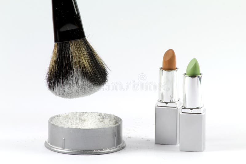 Powder brush, powder and erase sticks. Powder brush, powder and erase sticks