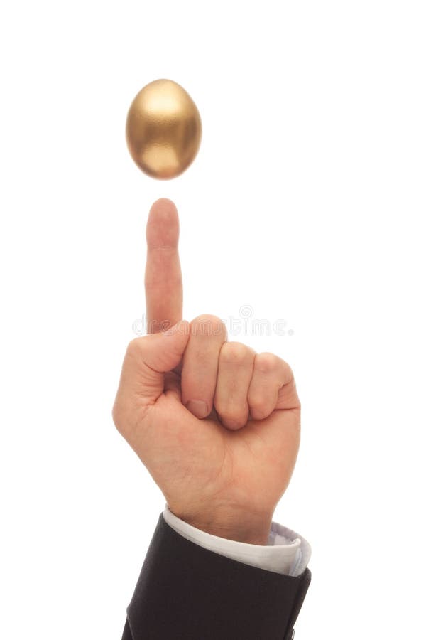 Сбалансировать Золотое Яйцо стоковое изображение