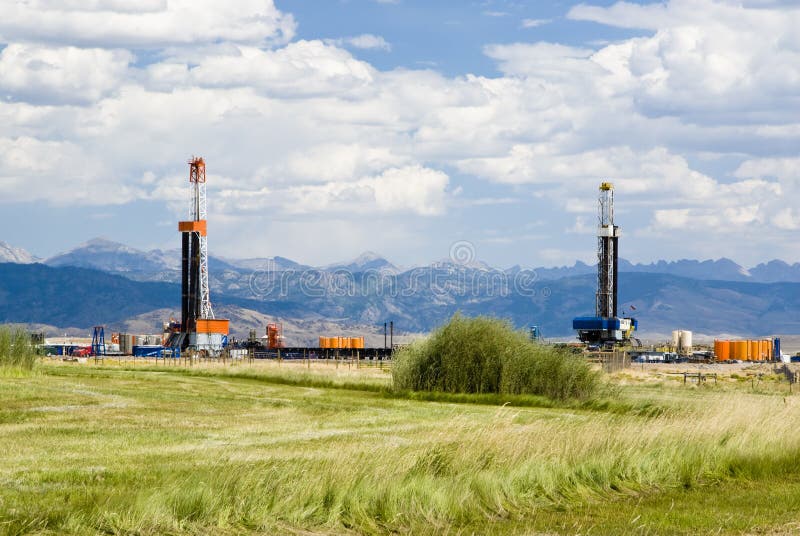 An oil drilling rigs in the oil fields of Wyoming. An oil drilling rigs in the oil fields of Wyoming