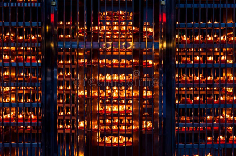 Large number of Candles lightened in a temple  . Large number of Candles lightened in a temple