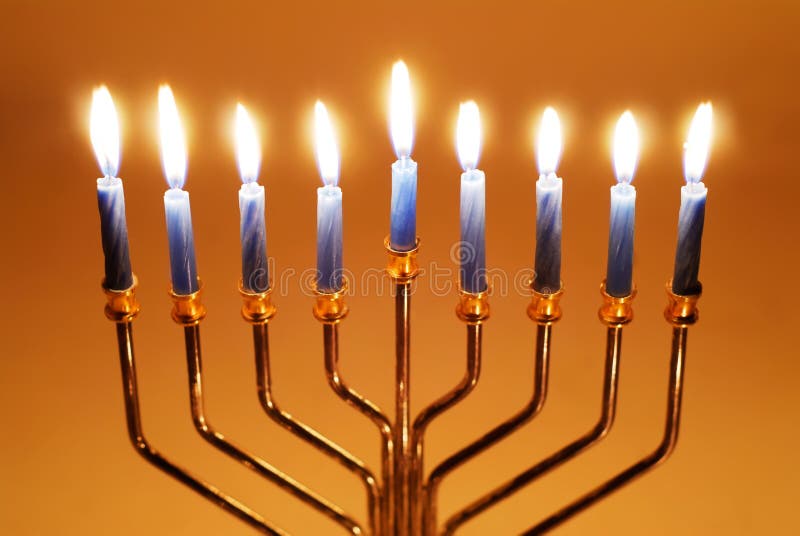 Brightly lit menorah on the eighth night of Hanukkah. Brightly lit menorah on the eighth night of Hanukkah