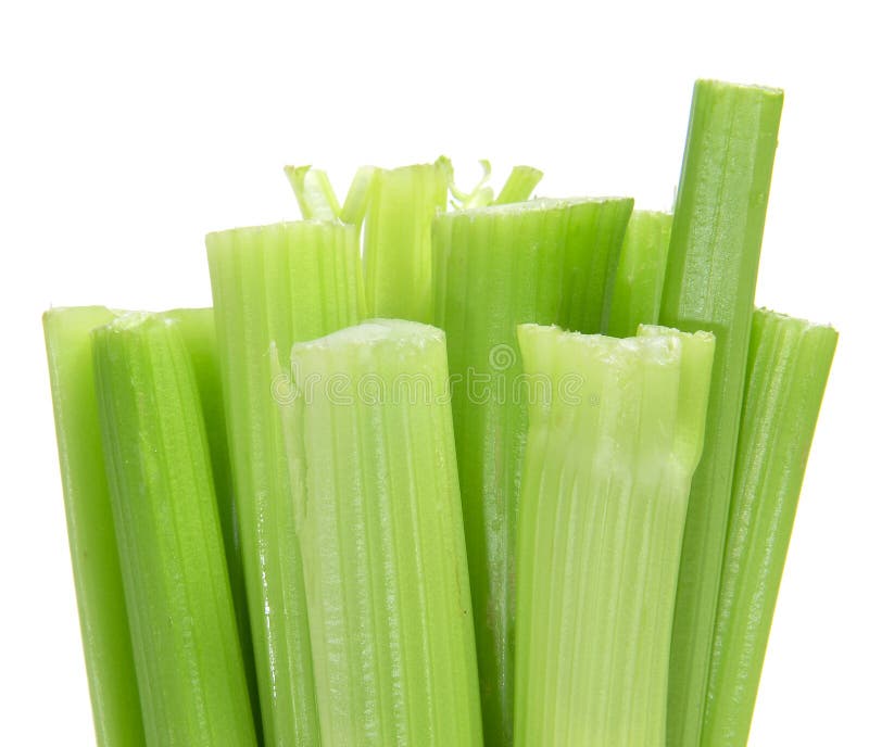 A pile of celery ribs on a white background. A pile of celery ribs on a white background