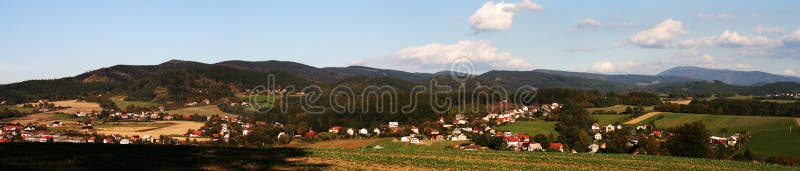 A wide panoramic view of the rolling countryside near the Czech Republic city of Valasske Mezirici. A wide panoramic view of the rolling countryside near the Czech Republic city of Valasske Mezirici.