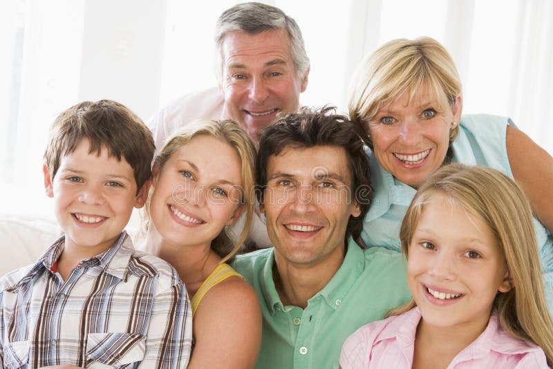 Family indoors together smiling together. Family indoors together smiling together